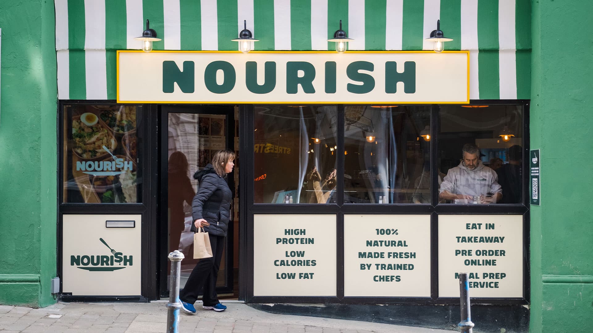 Customer outside the Nourish shop
